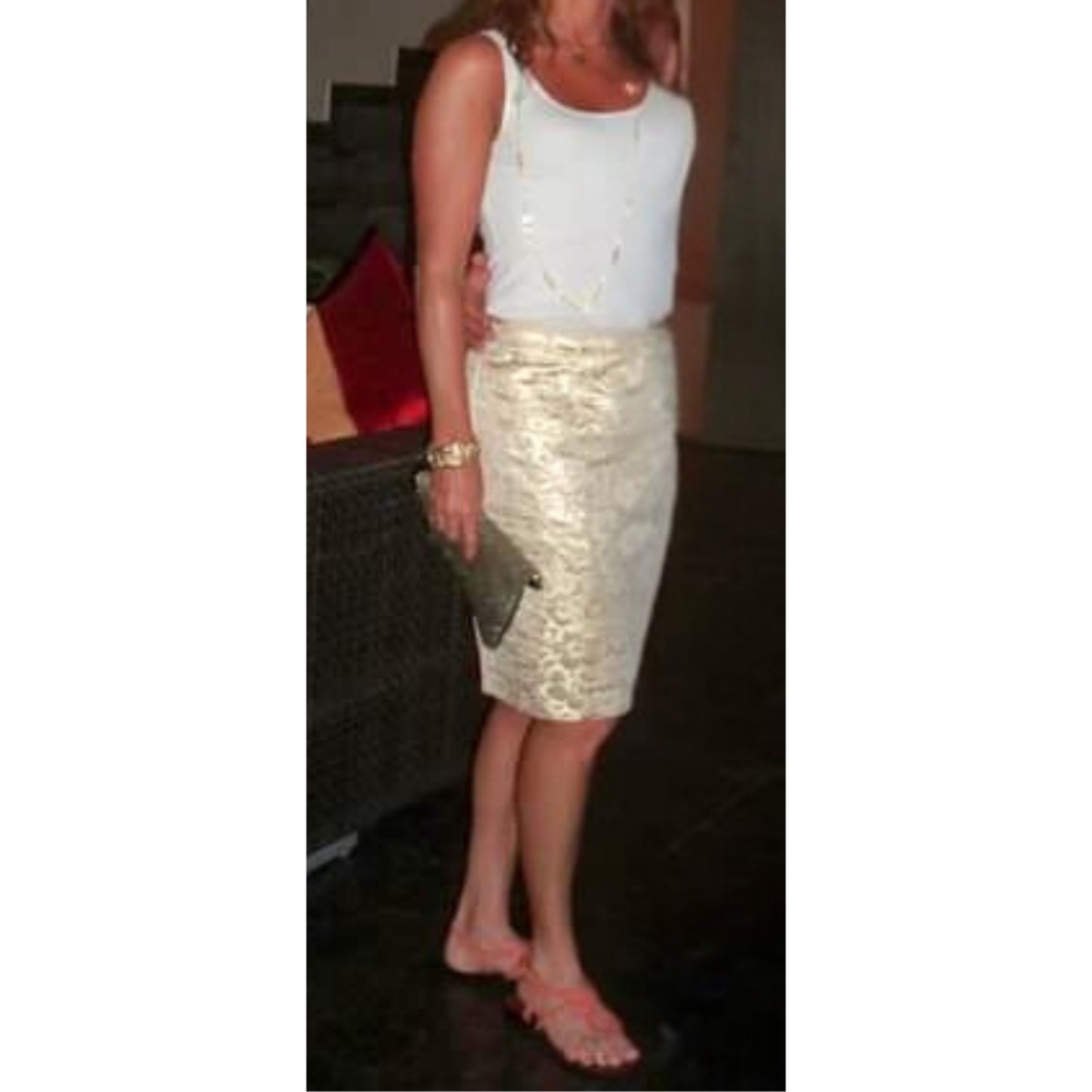 Gold embossed pencil skirt.